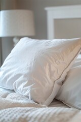 Fototapeta na wymiar Clean and Hygienic White Pillow: Bedroom Interior Close-up