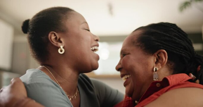 Sofa, kiss and senior mother hug woman for loving relationship, bonding and relax together. Family, home and African mom with daughter kissing forehead for love, care and embrace in living room