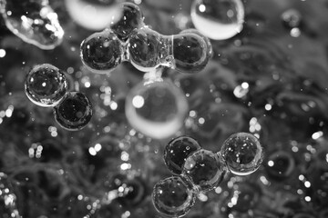 Macro shot of drop pearl bubbles on water