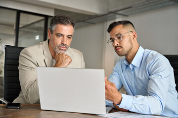 Busy professional business team people of two smiling latin executive business men having...