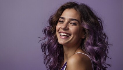 Argentinian woman in her 20s with beautiful wavy hair posing smilingly against a light purple background, studio shot, space for advertising