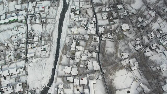 Top view of snow covered Skardu city during winter season in Pakistan. Aerial shot.