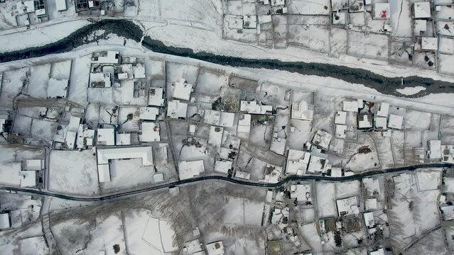 Aerial top view of Skardu city covered with snow in Pakistan.