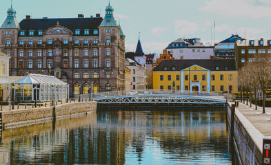 Water channel and architecture buildings in the center of Malmö. Malmo city urban landscape. 