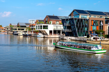 Tour ship on the river Ems in Leer, East Frisia,Lower Saxony,Germany - obrazy, fototapety, plakaty