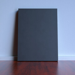 The board is black on a white wall background.