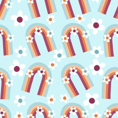 Obraz premium Seamless pattern with flowers and rainbows