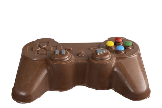 Milk chocolate in the shape of a video game controller alongside small rabbits_1.