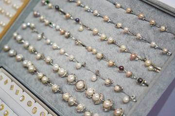 Close-up of pearl jewelry for sale in store