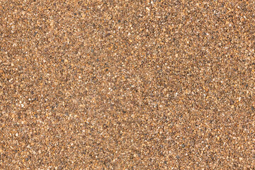 An aerial view of a large, stony surface ground texture. Image is ready to be tiled to create a...