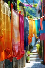 Brightly colored clothes hanging to dry in the background