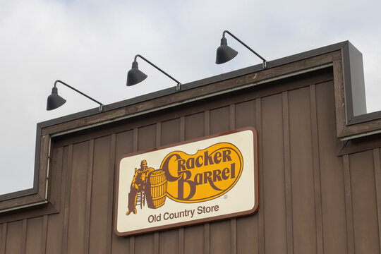 Tualatin, OR, USA - Feb 17, 2022: Cracker Barrel sign is seen at its location in Tualatin, Oregon. Cracker Barrel is an American chain of restaurants and gift stores with a Southern country theme.