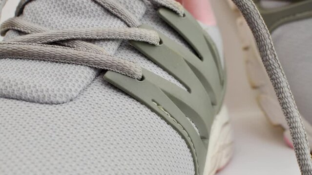 Close-up of running shoes, modern and comfortable design for your daily journey. Walking shoe detail, stylish and ergonomic, providing unparalleled comfort.