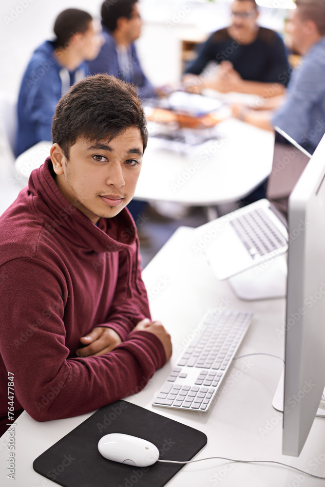 Poster Business man, computer and portrait at office desk for web development, programming or information technology. Young programmer, worker or online designer on multimedia, planning and startup project