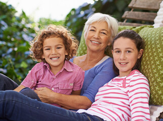 Relax, grandmother and children in a garden, portrait and happiness with vacation and weekend...