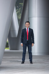 Chinese business man in modern Asian city