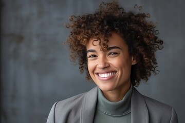 Portrait of a happy young african american woman with curly hair