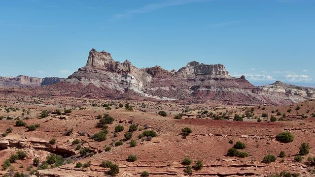 Aerial Temple Mountain southern Utah desert landscape. San Rafael Swell geologic environment southern Utah. Abandoned uranium mines. Giant sandstone rocks valleys, canyons, gorges, mesas. Travel. 