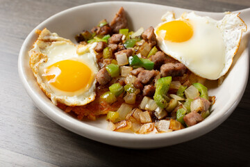 A closeup view of a breakfast skillet.