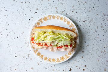A top down view of a turkey sandwich.