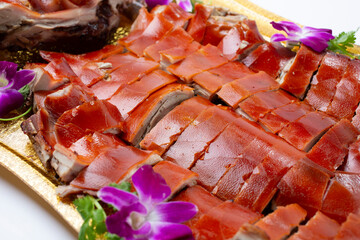 A view of a platter of Chinese whole roast pig.