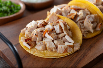 A closeup view of chicken tacos.