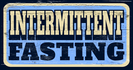 Grunge intermittent fasting sign on wood - 764521077