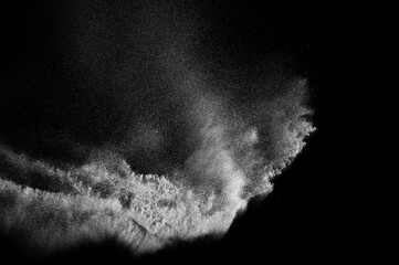 Abstract dust overlay texture. Motion of white particles on black background. Powder explosion.	
