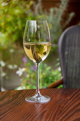 white wine on the wooden table
