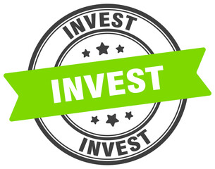 invest stamp. invest label on transparent background. round sign