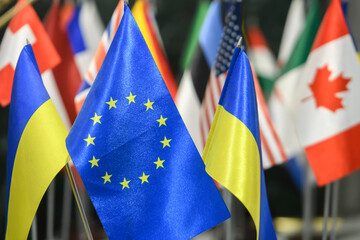 The national flag of Ukraine and the flags of the European Union and the another counties flags...