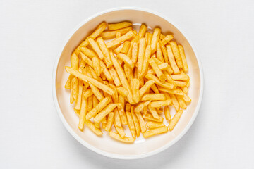 golden french fries on the white