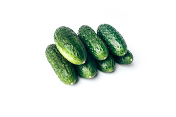 Fresh green cucumbers, natural vegetables organic food are isolated on white background.