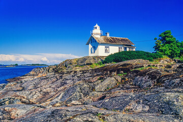 Lighthouse on a cliff in a beautiful archipelago