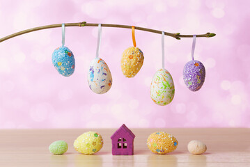 Festive Easter Decor with Hanging Eggs and Miniature Houses - 764539263