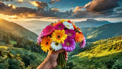 Foto auf Glas bunch of colorful flowers in front of beautiful landscape © creativemariolorek