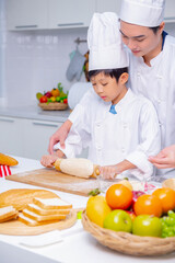 father and son cooking
