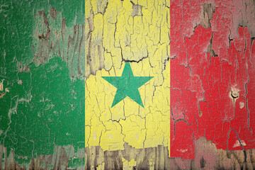 Senegal flag painted on the cracked wall