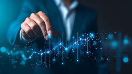Businessman Trader's Finger Pointing at Financial Graph