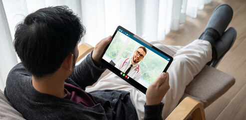 Doctor video call online by modish telemedicine software application for virtual meeting with patient - obrazy, fototapety, plakaty