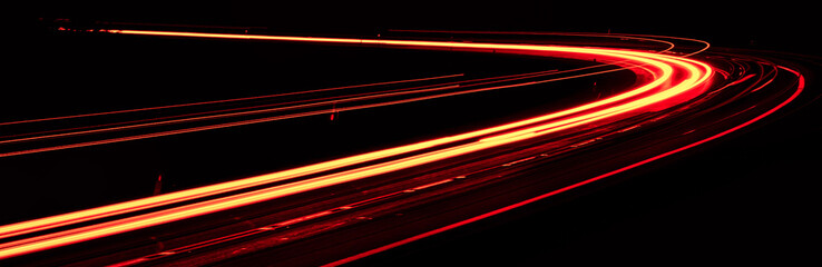 red car lights at night. long exposure