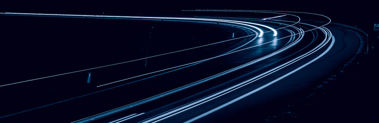 Plakaty  blue car lights at night. long exposure
