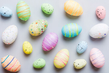 decorative easter eggs on colored background. easter eggs collection top view with copy space