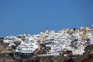 Fototapeta na wymiar View of the coastal village Oia on the crater rim from the Cyclades island of Santorini-Thera -Greece