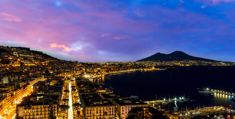 beautiful night panorama of Naples city with nice lights streets flashlights and buildings and...