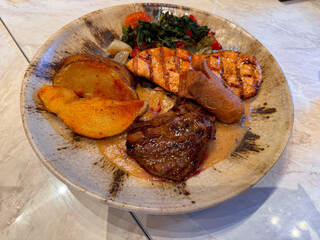 beef steak in ceramic plate