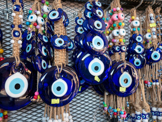 evil eye bead in turkish culture, big evil eye bead close up in gift shop,