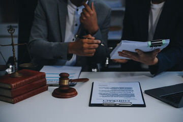 Consultation and conference of Male lawyers and professional businesswoman working and discussion...