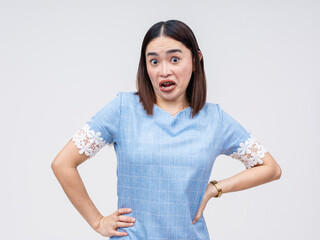 Skeptical Asian woman showing disbelief with a sarcastic expression, isolated on white