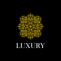 luxury ornamental mandala design background in gold color